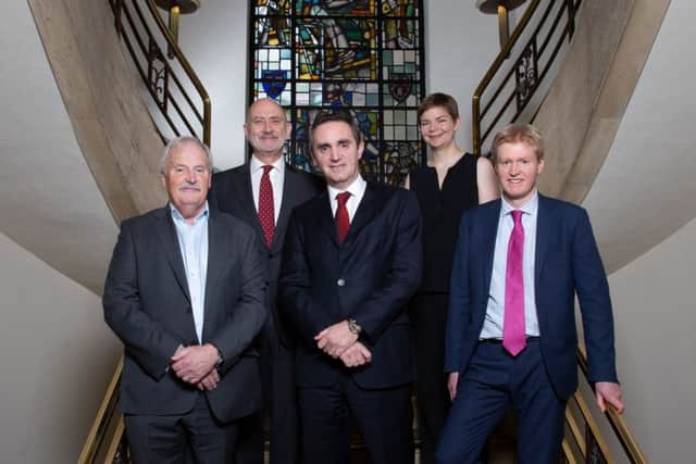 WJM managing partner Fraser Gillies (centre) with CCW Partners (L-R) John Clarke, Stephen Cotton, Alison Marshall and Michael Dewar. Picture: Mark F Gibson