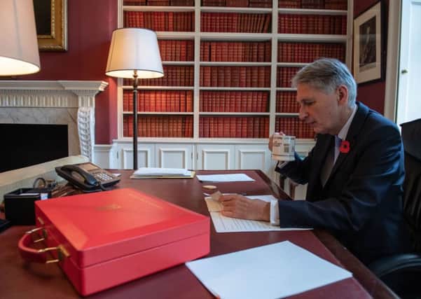 Will Philip Hammond's Budget mean a growing divide between Scottish and UK income taxpayers, asks Kevin Meaney. Picture: Chris J Ratcliffe/PA Wire