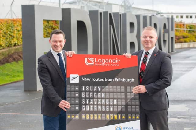 Jonathan Rayner of Edinburgh Airport and Loganairs MD Jonathan Hinkles unveil the routes. Picture: Contributed