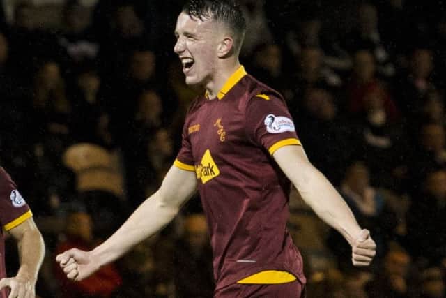 Motherwell's David Turnbull celebrates his opener. Picture: Sammy Turner/SNS