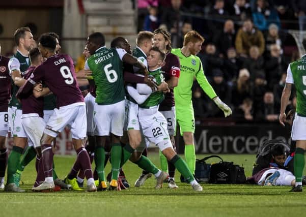 Tempers flare after  Florain Kamberi's challenge on Ollie Bozanic that led to the Hibs striker's dismissal in the second half.
