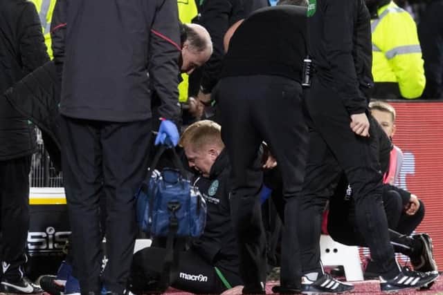 Neil Lennon was struck by a coin during yesterday's Edinburgh derby (Photo: SNS)