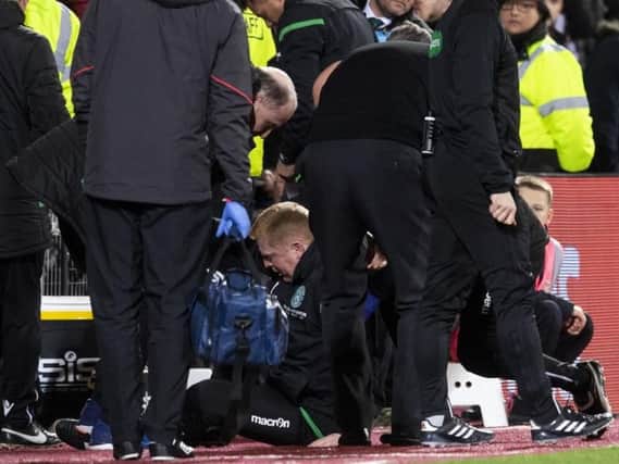 Neil Lennon was struck by a coin during yesterday's Edinburgh derby (Photo: SNS)