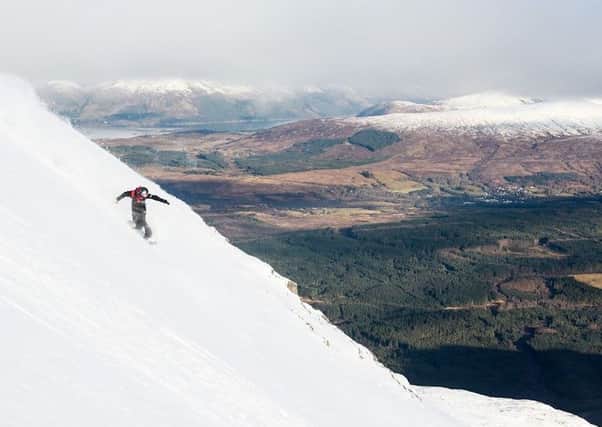 Snowboarder Rhys Crilley spreading his wings on Winger Wall at Nevis Range PIC: Stevie McKenna