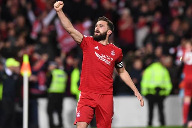 Graeme Shinnie celebrates Aberdeen's Betfred Cup semi-final win over Rangers. Picture: Paul Devlin/SNS