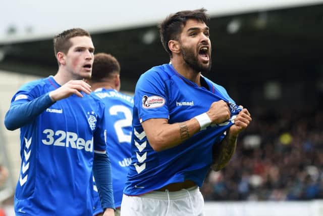 Daniel Candeias celebrates his opening goal. Picture: SNS