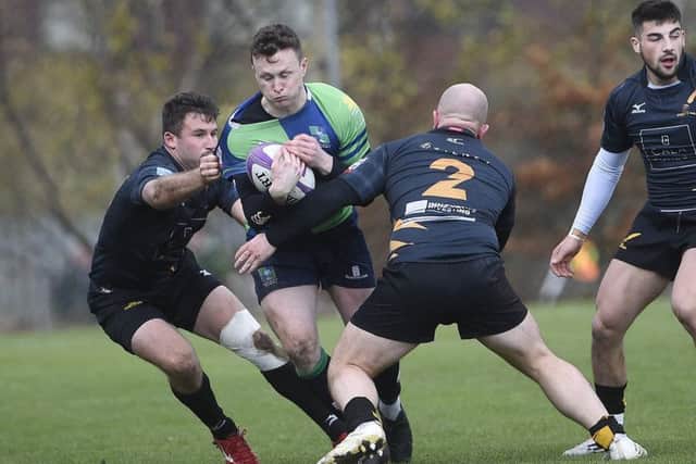 Boroughmuir's Gavin Parker
tries to find a way through against Currie. Picture: Greg Macvean