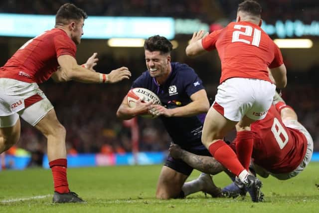 Scotland's Adam Hastings is tackled by Wales' Ross Moriarty. Picture: David Davies/PA Wire
