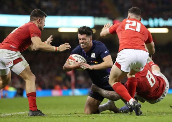 Scotland's Adam Hastings is tackled by Wales' Ross Moriarty. Picture: David Davies/PA Wire