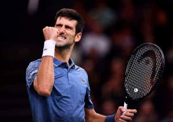 Novak Djokovic celebrates a point during his win over Roger Federer in the Paris Masters semi-final. Picture: Justin Setterfield/Getty Images