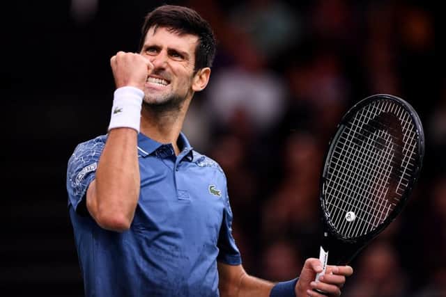 Novak Djokovic celebrates a point during his win over Roger Federer in the Paris Masters semi-final. Picture: Justin Setterfield/Getty Images