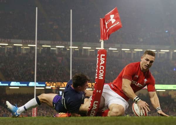 Wales winger George North goes over for a try only to be disallowed for a foot in touch. Picture: David Davies/PA Wire