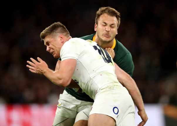 Owen Farrell crashes into South Africa's Andre Esterhuizen with a tackle that has polarised opinion. Picture: Adam Davy/PA Wire