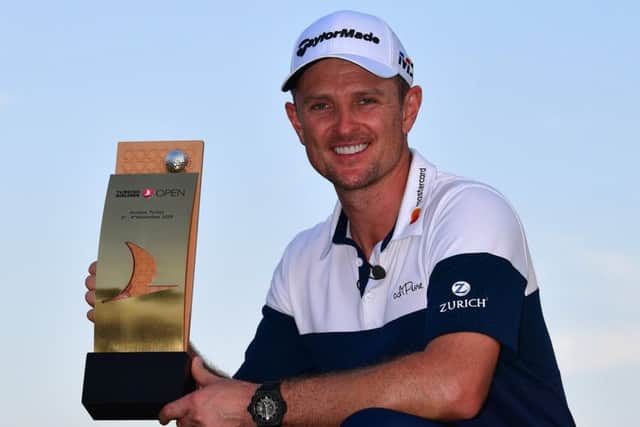 Justin Rose celebrates with the trophy after winning the Turkish Airlines Open for the second year running. Picture: Getty Images