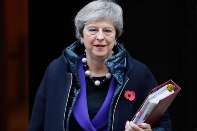 Theresa May's Brexit plan seems to please neither Remainers nor Brexiteers (Picture: Tolga Akmen/AFP/Getty Images)