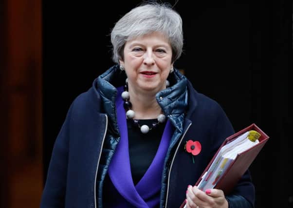 Theresa May's Brexit plan seems to please neither Remainers nor Brexiteers (Picture: Tolga Akmen/AFP/Getty Images)