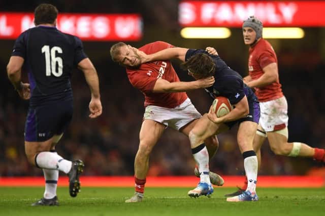 Ross Moriarty of Wales and Scotland's Hamish Watson get to grips with each other during Saturday's match in Cardiff.  Picture: Harry Trump/Getty Images