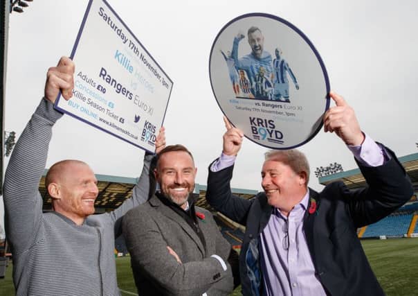 Kris Boyd, centre, with his Kilmarnock team-mate Chris Burke, left, and Ally McCoist at the launch of Boyd's testimonial game between a Kilmarnock Heroes XI and a Rangers Euro XI. McCoist, will manage the Rangers Euro XI. Picture: Steve Welsh
