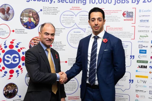 Warren East, chief executive of Rolls-Royce and Yan Tiefenbrun, managing director of Castle Precision Engineering. Picture: Contributed