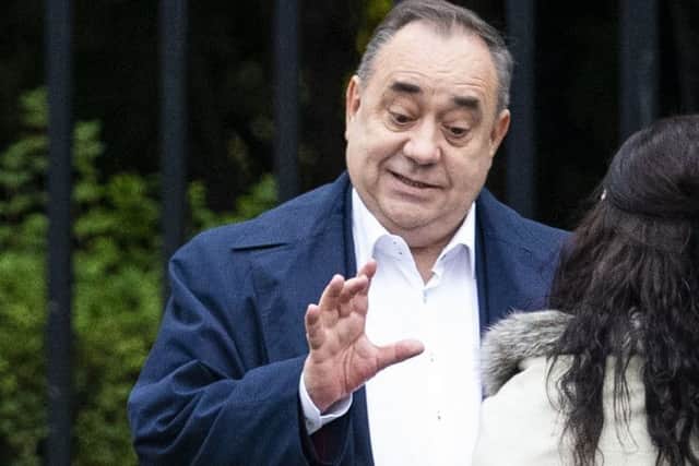 First Minister Alex Salmond is seen today filming outside of the Scottish Parliament and Holyrood Palace this afternoon in Edinburgh. Picture: Duncan McGlynn