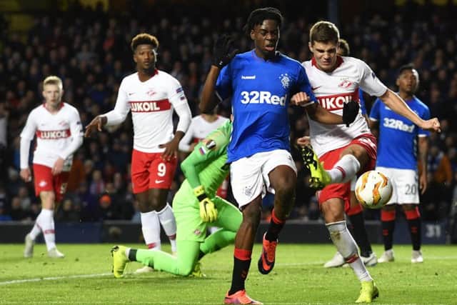 Rangers midfielder Ovie Ejaria, left, tussles with Spartak Moscow's Roman Zobnin during the 0-0 draw at Ibrox. Picture: SNS