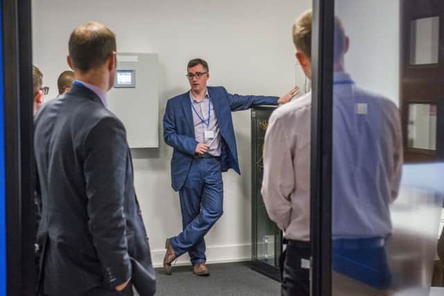 The companys production engineering director, Euan Davidson, speaking to guests at a demonstration in the Glasgow lab. Picture: Chris Watt Photography