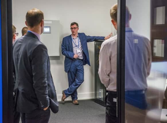 The companys production engineering director, Euan Davidson, speaking to guests at a demonstration in the Glasgow lab. Picture: Chris Watt Photography