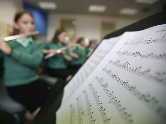 Young people spoke to MSPs about the effect the fees have had on instrument tuition.