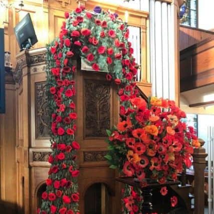 Knitted poppies for the High Kirk Rothesay.Photo by Iain Macleod.
