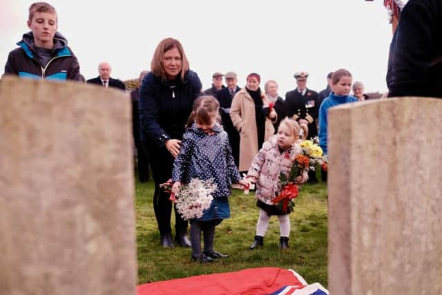 The MacFarlane family at Remembrance Sunday, Cnoc-an-Raer.Photo by Iain Cochrane.