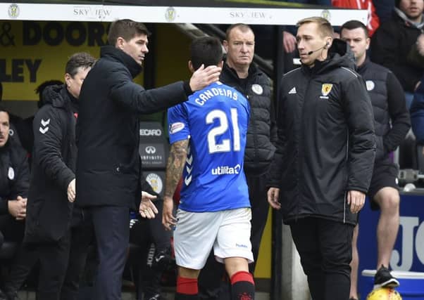 Rangers manager Steven Gerrard with Daniel Candeias after the latter is shown a red card. Picture: SNS