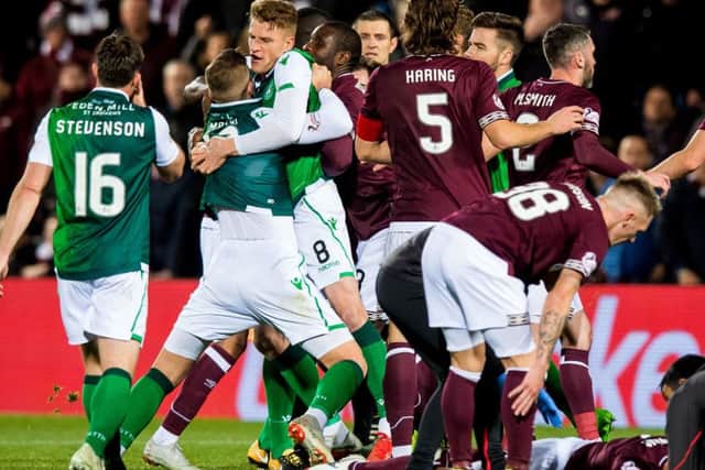 Players had to be separated during a heated confrontation in the Edinburgh derby. Picture: SNS