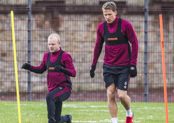 Hearts team-mates Steven Naismith and Christophe Berra. Picture: SNS