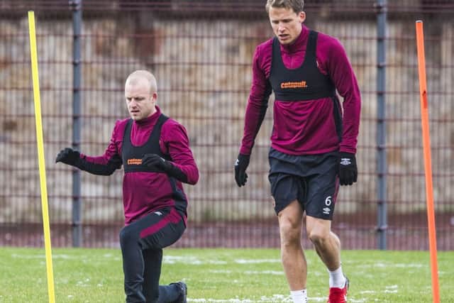 Hearts team-mates Steven Naismith and Christophe Berra. Picture: SNS