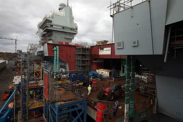 She will be commissioned in 2020 and is the second Queen Elizabeth-class aircraft carrier under construction for the Royal Navy  plus the seventh Royal Navy ship to have the name HMS Prince of Wales. Andrew Milligan/PA Wire