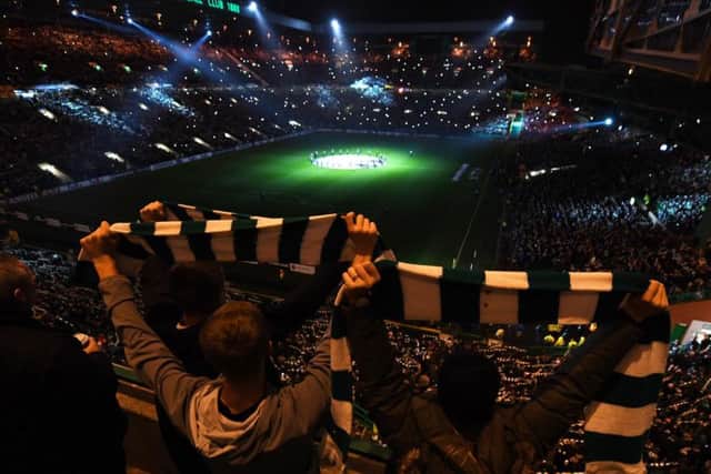 Celtic fans are treated to the stadium's light show ahead of the match. Picture: SNS Group