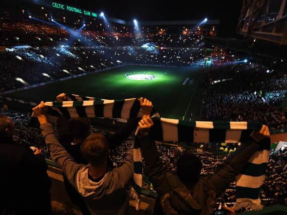 Celtic fans are treated to the stadium's light show ahead of the match. Picture: SNS Group