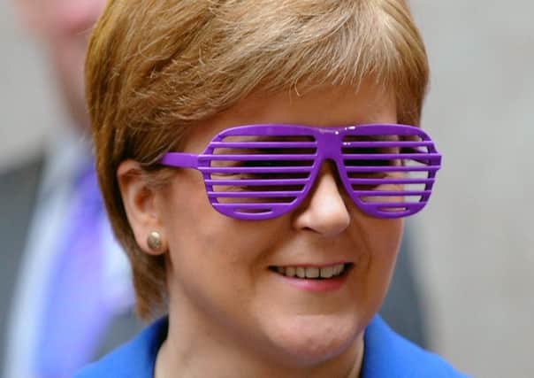 First Minister Nicola Sturgeon wears purple to pledge support for LGBTI youth. Picture: Lisa Ferguson