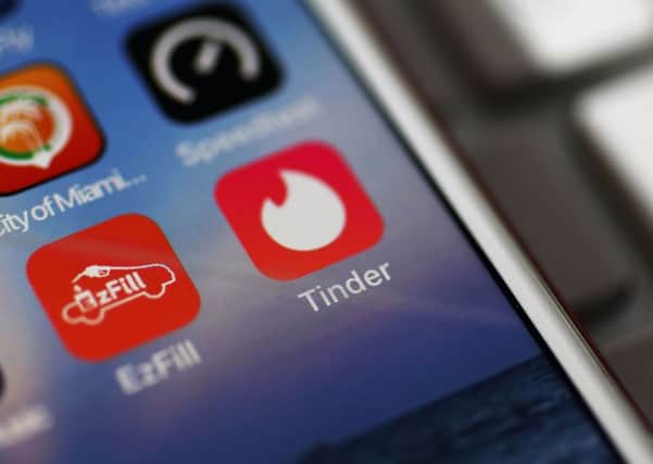 Dating app Tinder.  (Photo illustration by Joe Raedle/Getty Images)