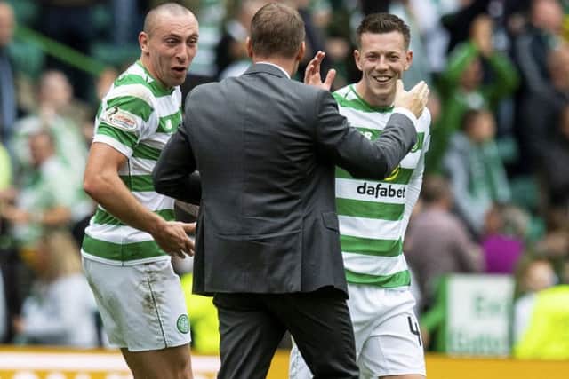 Celtic manager Brendan Rodgers with Scott Brown and Callum McGregor. Pic: SNS