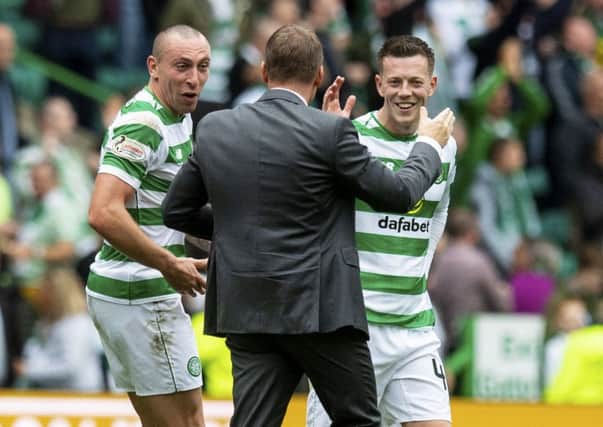 Celtic manager Brendan Rodgers with Scott Brown and Callum McGregor. Pic: SNS