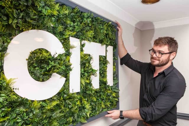 Ritchie Duthie, general manager of Citi Hotel and Citi Hostel Aberdeen, puts the final touches to the building ahead of its opening.