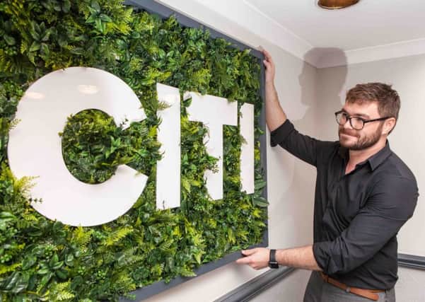 Ritchie Duthie, general manager of Citi Hotel and Citi Hostel Aberdeen, puts the final touches to the building ahead of its opening.