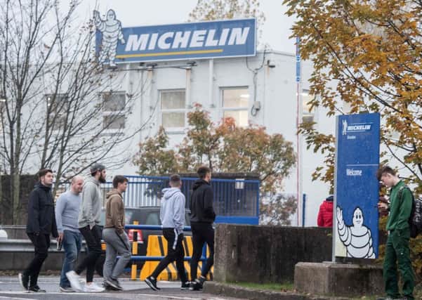 Staff arrive at the Michelin tyre factory in Dundee after the company announced plans to close the facility in 2020 with a loss of 850 jobs. Picture: Michal Wachucik/AFP/Getty Images