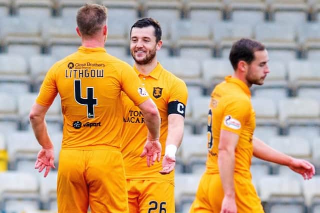 Livingston defenders Alan Lithgow, left, and Craig Halkett were both on target in last month's 4-0 home win over Dundee. Picture: SNS
