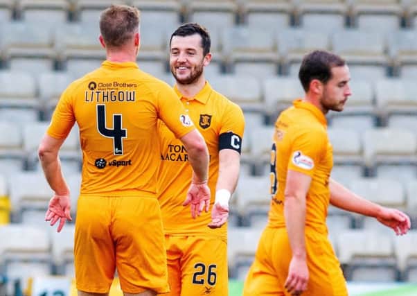 Livingston defenders Alan Lithgow, left, and Craig Halkett were both on target in last month's 4-0 home win over Dundee. Picture: SNS