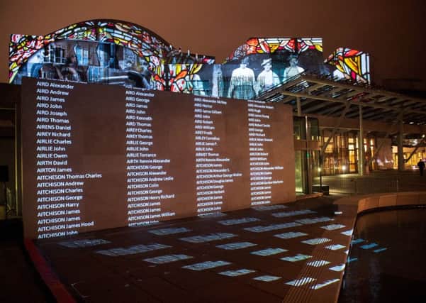 Names of WW1 fallen illuminate Scottish Parliament