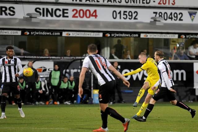 Zak Rudden scores the game's only goal. Pic: Michael Gillen