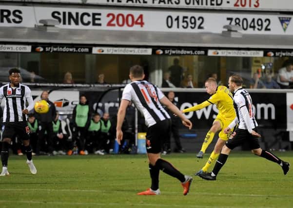 Zak Rudden scores the game's only goal. Pic: Michael Gillen