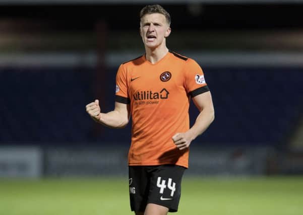 Dundee United's Paul Watson scored the game's only goal. Pic: SNS/Craig Foy